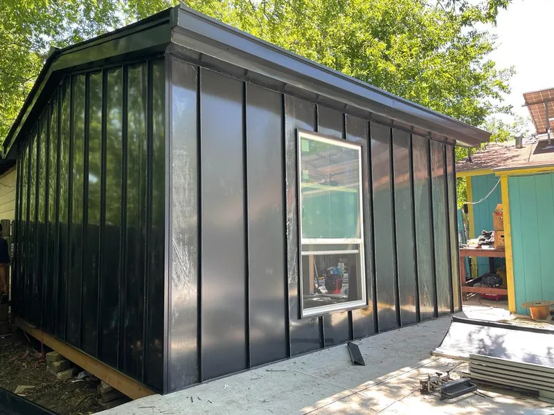 Black standing seam metal wall panels for Metal Roof Installation in Griffith