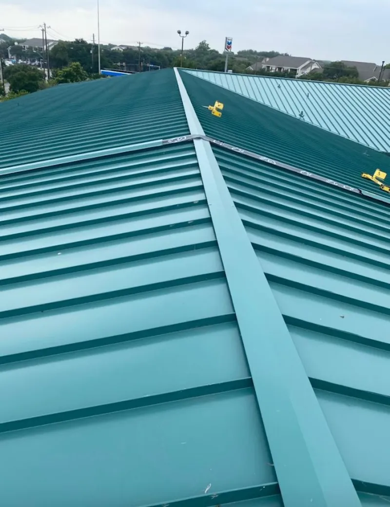Green commercial metal roof ridge and valley for Metal Roof Repair in Griffith